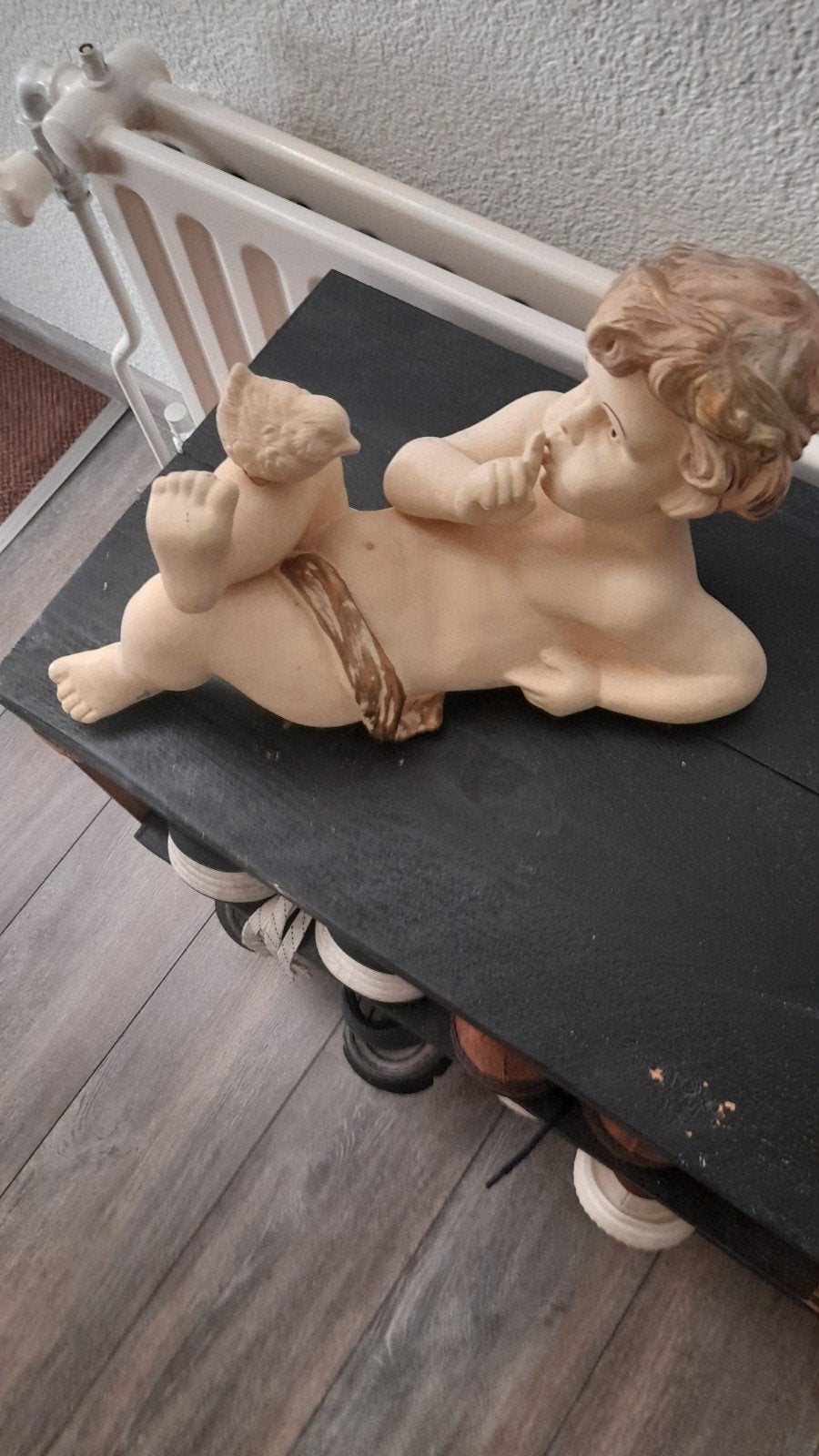 Schattig beeldje van slapende cherubijn, Ophalen