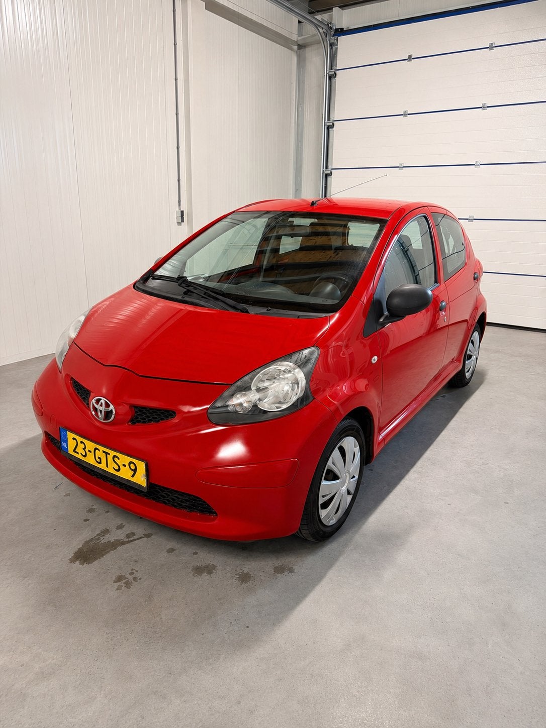 Toyota Aygo 1.0 (carplay)12V Vvt-i 5DRS 2008 Rood, Auto's, Voorwielaandrijving, Stof, Zwart, 4 stoelen