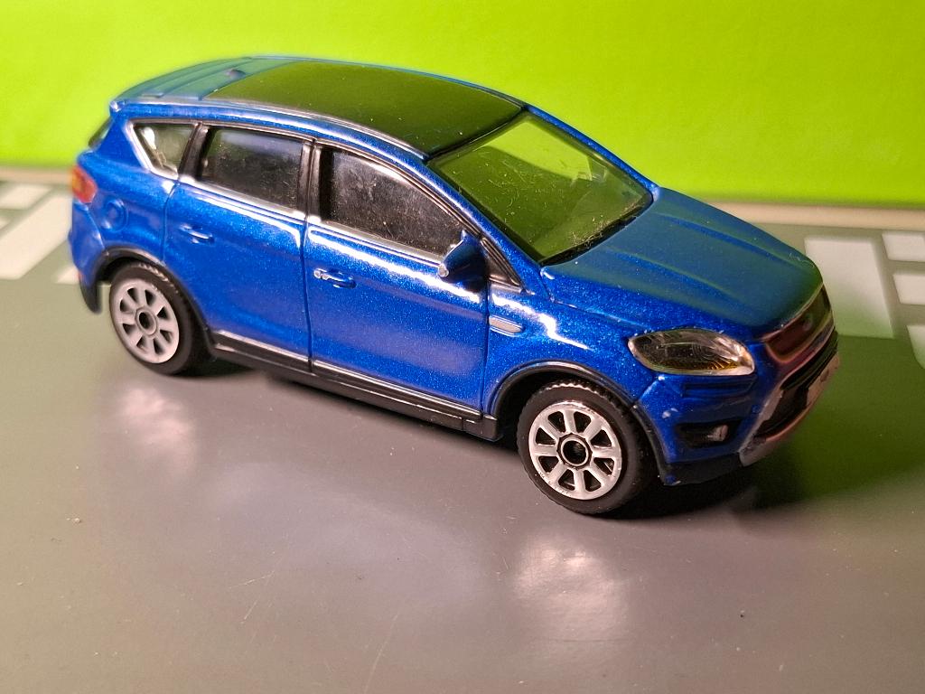 Bburago - 2009 Ford Kuga [blauw] 1/43, Hobby en Vrije tijd, Modelauto's | 1:43, Ophalen of Verzenden, Gebruikt, Auto, Overige merken