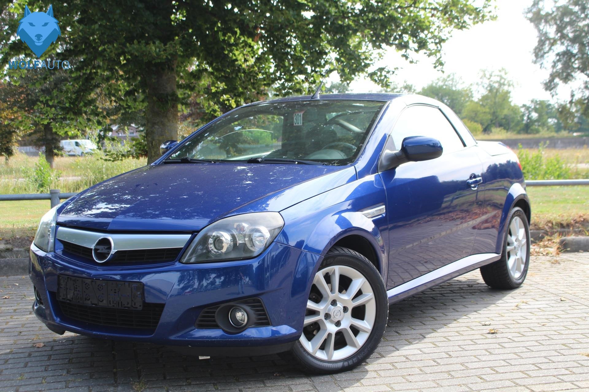 Opel Tigra 1.8 Roadster PRACHTIGE AUTO!, Auto's, Opel, 4 cilinders, Cabriolet, Blauw, Bedrijf