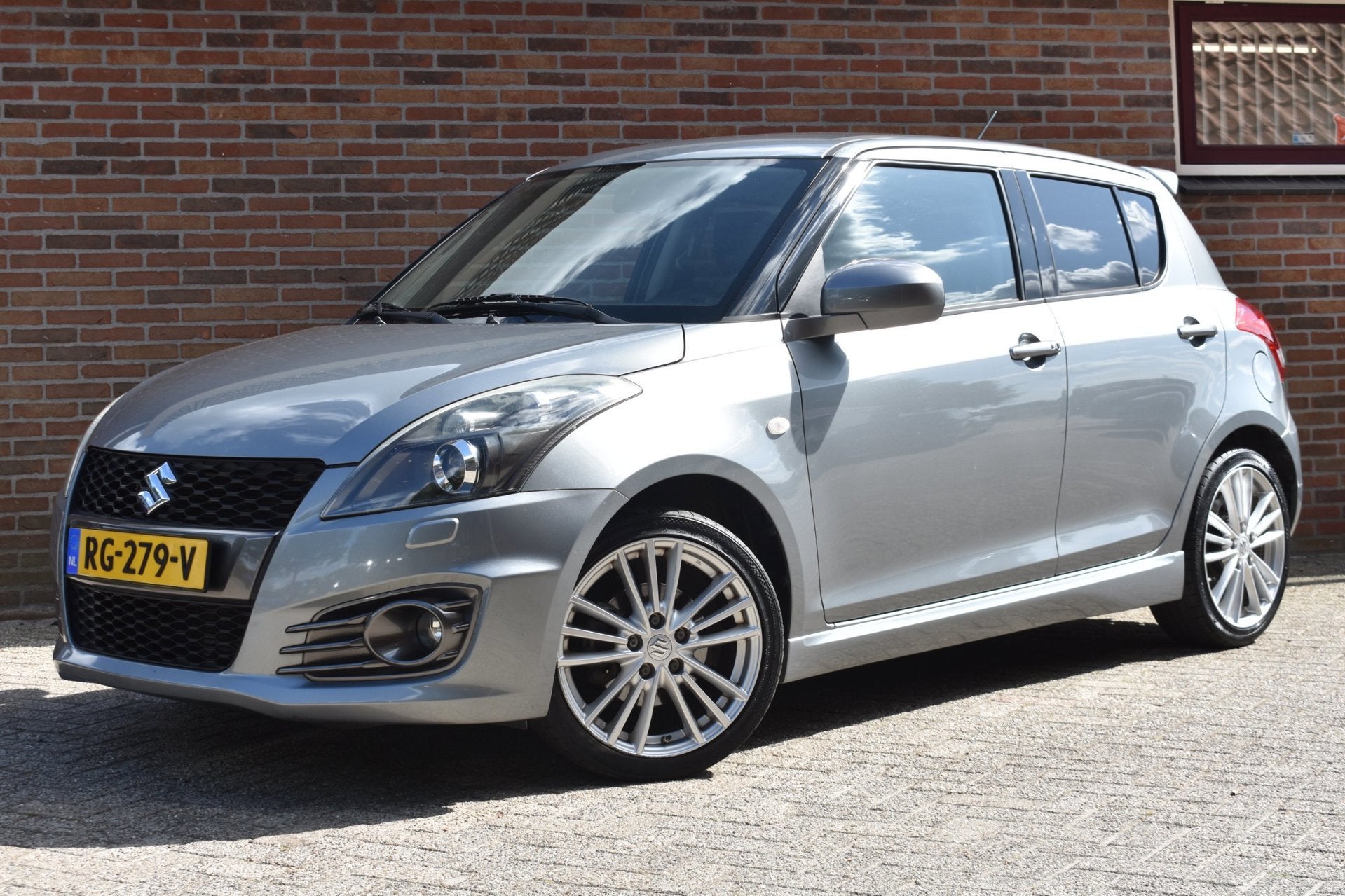 Suzuki Swift 1.6 Sport '15 Xenon Navi Clima Cruise Inruil mo, Voorwielaandrijving, 4 cilinders, Stoelverwarming, 400 kg