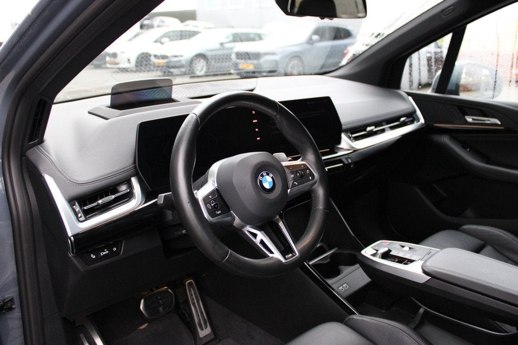 BMW 2 Serie Active Tourer 218i M Sport Automaat / Panoramada, Auto's, BMW, 136 pk, Gebruikt, Met garantie (alle), 1445 kg