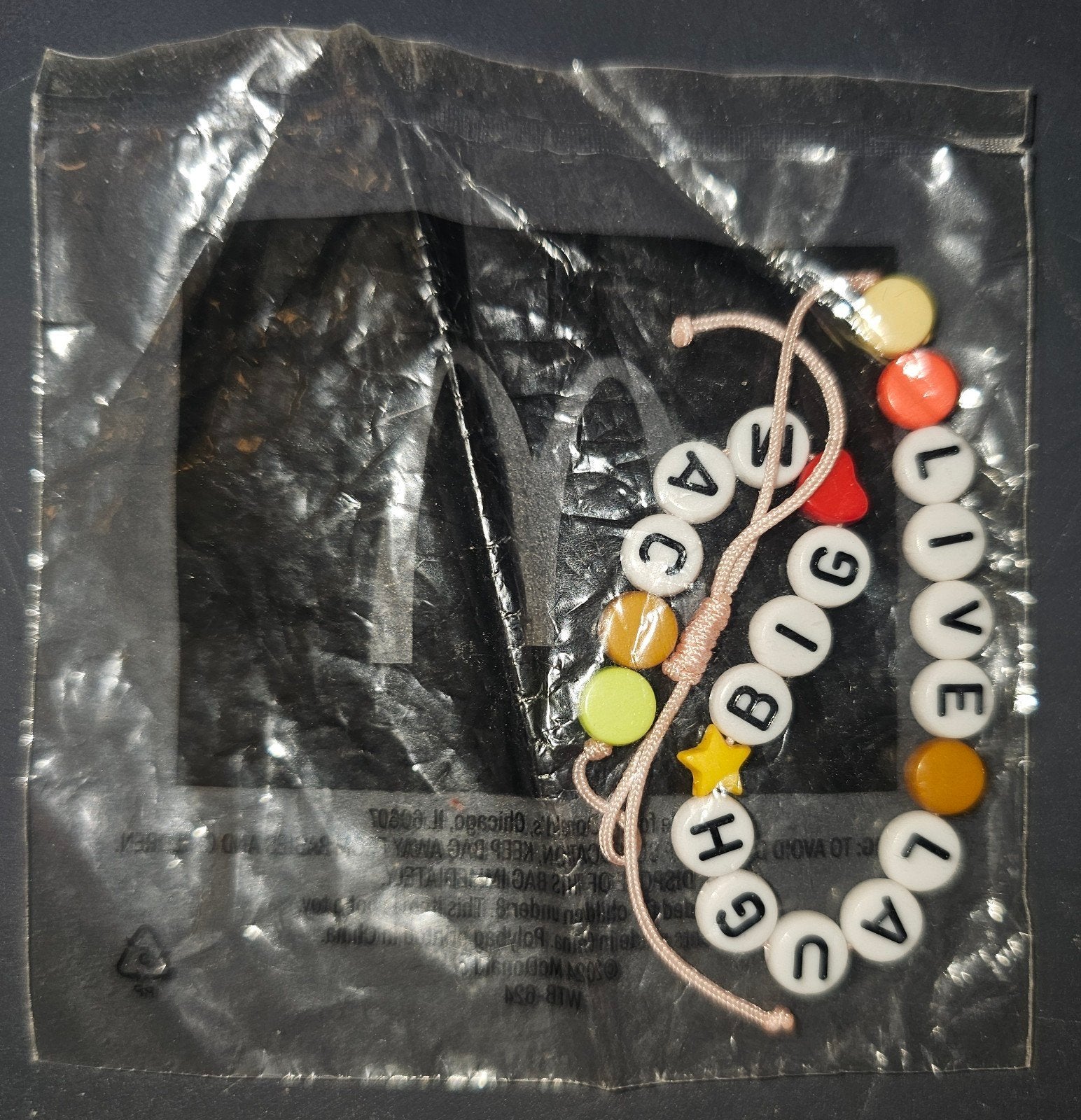 McDonald's big Mac Armband - Nieuw in verpakking, Overige kleuren, Kunststof of Plastic, Nieuw, Ophalen of Verzenden