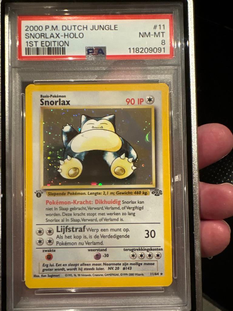 Snorlax Holo 1st Edition PSA 8 - 2000 P.M. Dutch Jungle, Ophalen of Verzenden, Zo goed als nieuw, Losse kaart, Foil