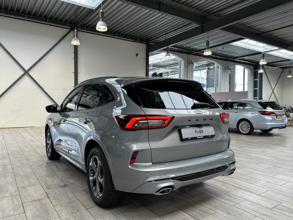 Ford Kuga 2.5 PHEV 243 pk ST-Line X I AGR stoelen | Adapt Cr, Auto's, Ford, 12 maanden, 14 kWh, Gebruikt, Zwart