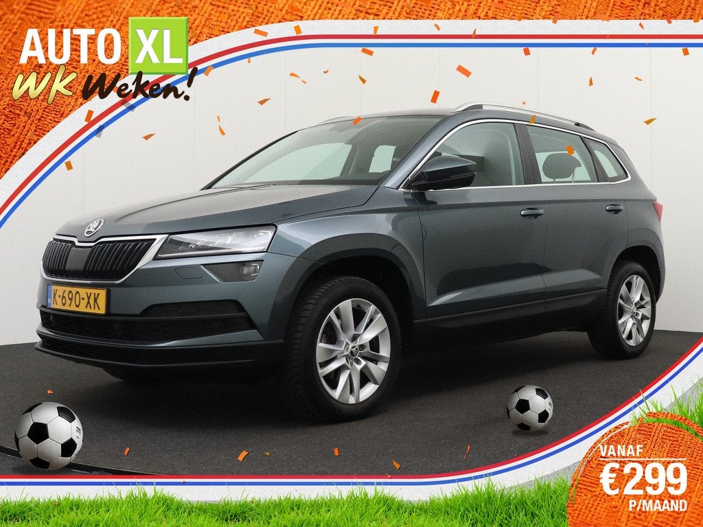 Skoda Karoq 1.5 150 PK Aut TSI Business Sport El.Trekhaak Ca, Auto's, Skoda, Stof, Bedrijf, 19 km/l, Zilver of Grijs