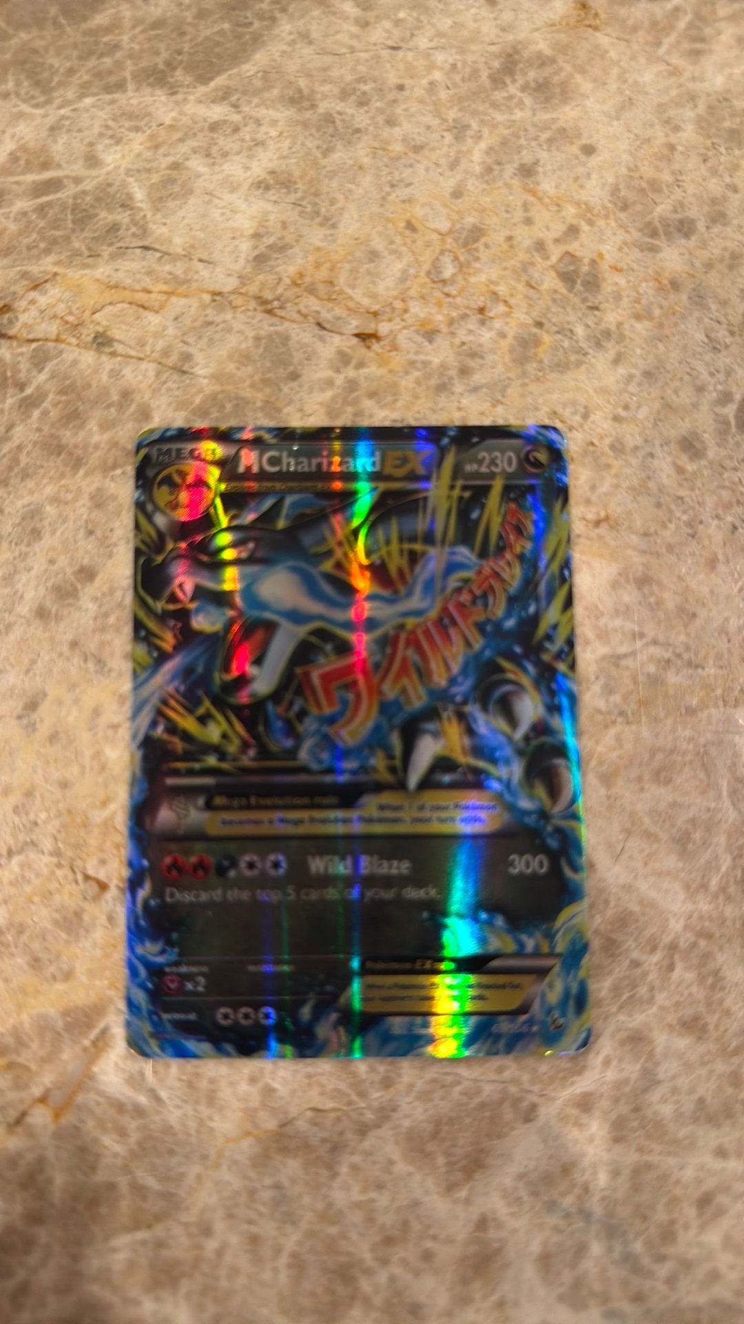 Pokemon MCharizard EX 230, Ophalen of Verzenden, Zo goed als nieuw, Speelkaart(en)