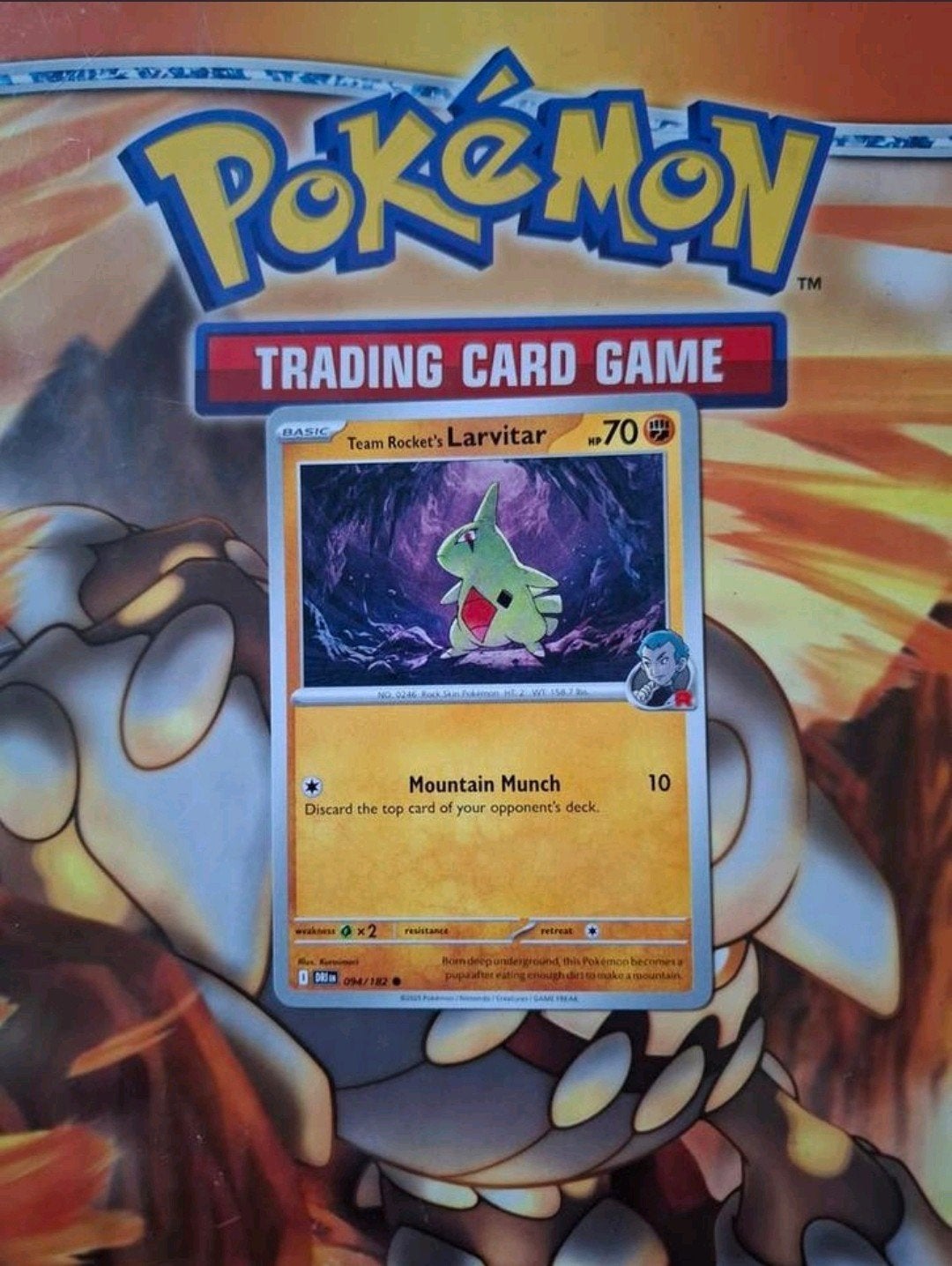 Team rocket's Larvitar 094/182 Destined Rivals nm-mint, Ophalen of Verzenden, Zo goed als nieuw, Losse kaart