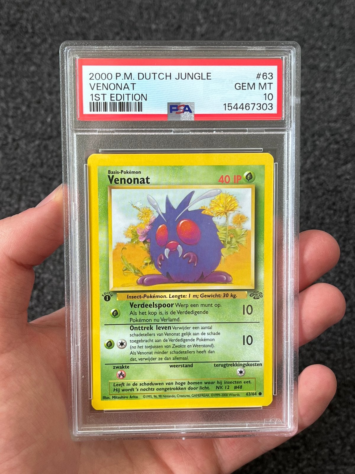 Pokémon PSA 10 Dutch 1st Ed. Venonat #63 Jungle (POP 12!), Ophalen of Verzenden, Zo goed als nieuw, Losse kaart, Foil