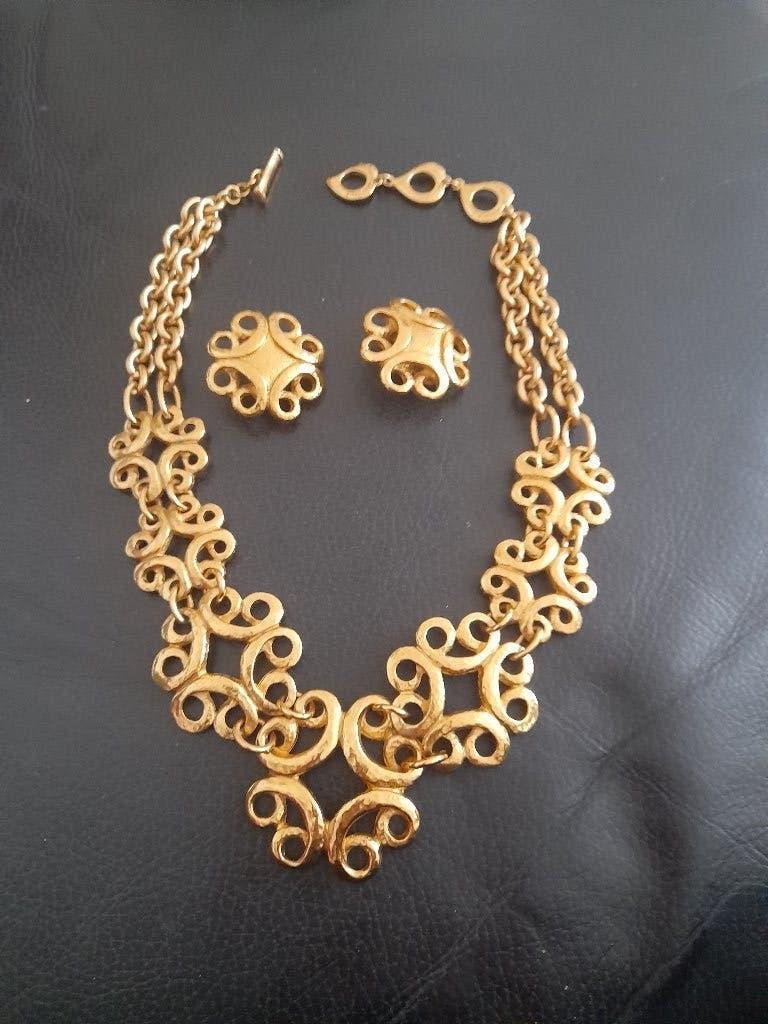 Zeldzame Yves Saint Lauren ketting en oorbellen, Ophalen of Verzenden, Zo goed als nieuw, Goud, Goud