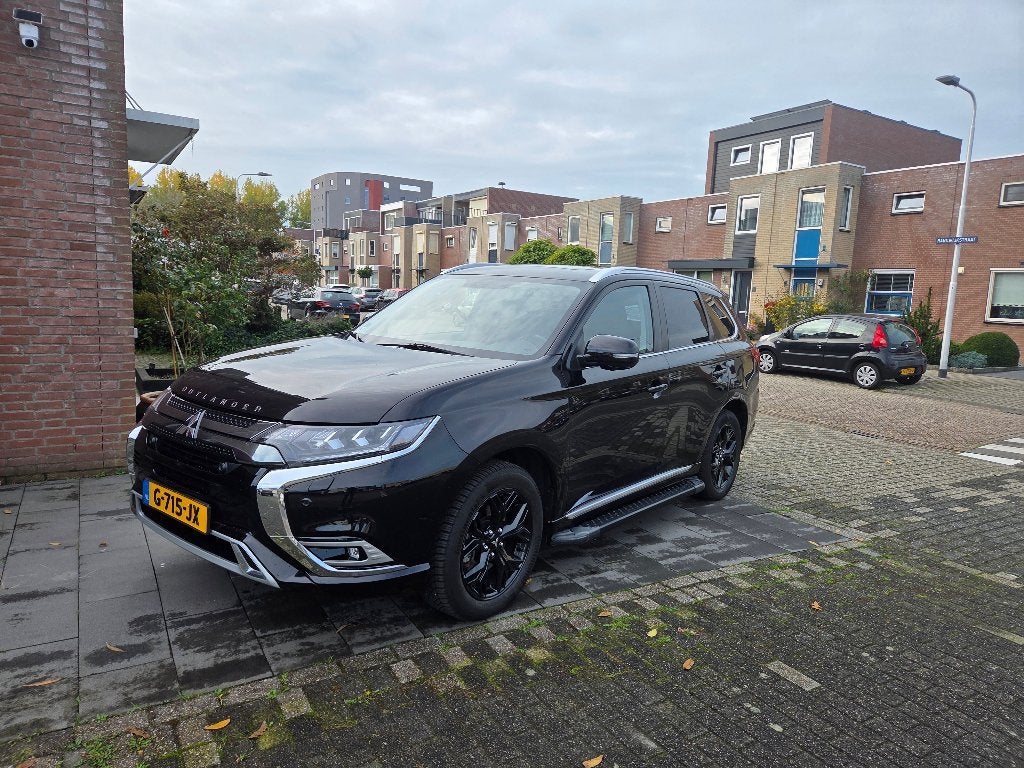 Mitsubishi Outlander 2.4 Dohc Mivec Phev 240pk 4WD Aut 2019, Auto's, Automaat, Outlander, Zwart, 4 cilinders