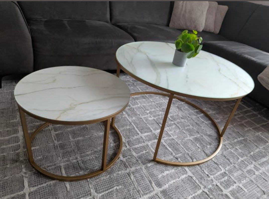 Set van 2 ronde salontafels met glazen blad en gouden poten, Huis en Inrichting, Tafels | Salontafels, Gebruikt, 50 tot 100 cm