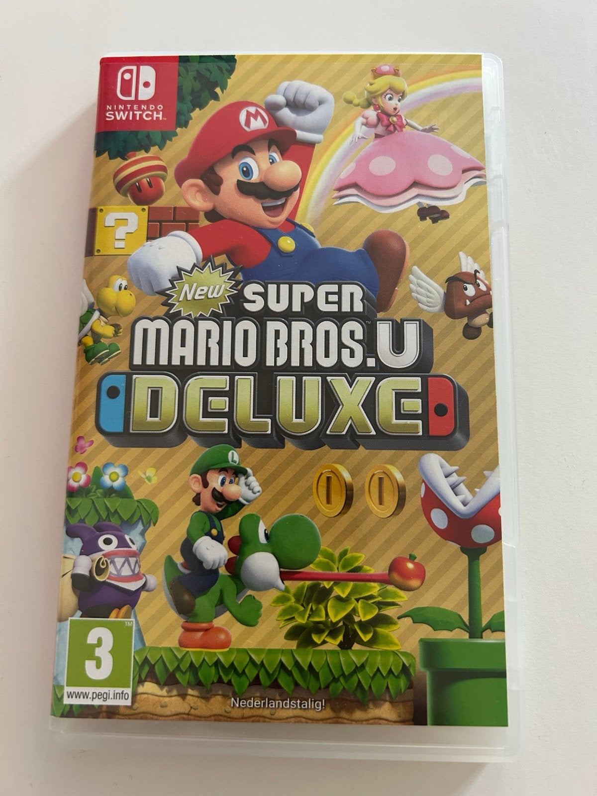 New Super Mario Bros. U Deluxe - Nintendo Switch, Spelcomputers en Games, Eén computer, Ophalen of Verzenden, Zo goed als nieuw