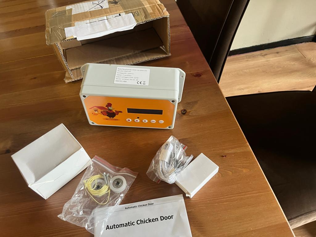 Automatische kippendeur, Ophalen of Verzenden, Zo goed als nieuw