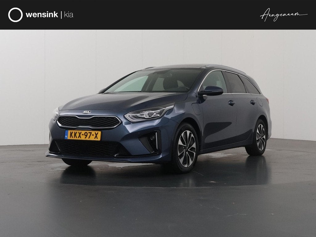 Kia Ceed Sportswagon 1.6 GDI PHEV DynamicPlusLine | Stoel/St, Auto's, Gebruikt, Blauw, Leder en Stof, Plug-in hybride