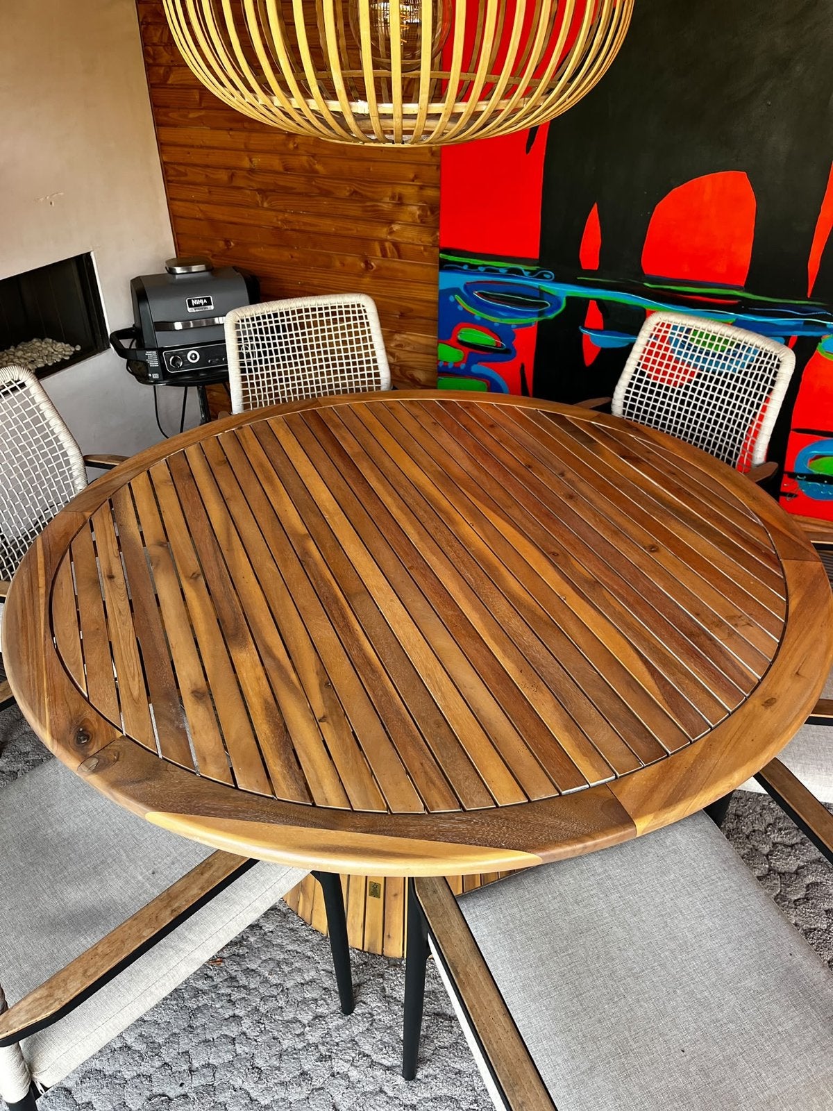 Foto 7 van Ronde eettafel met 6 stoelen - Teakhout en Wicker