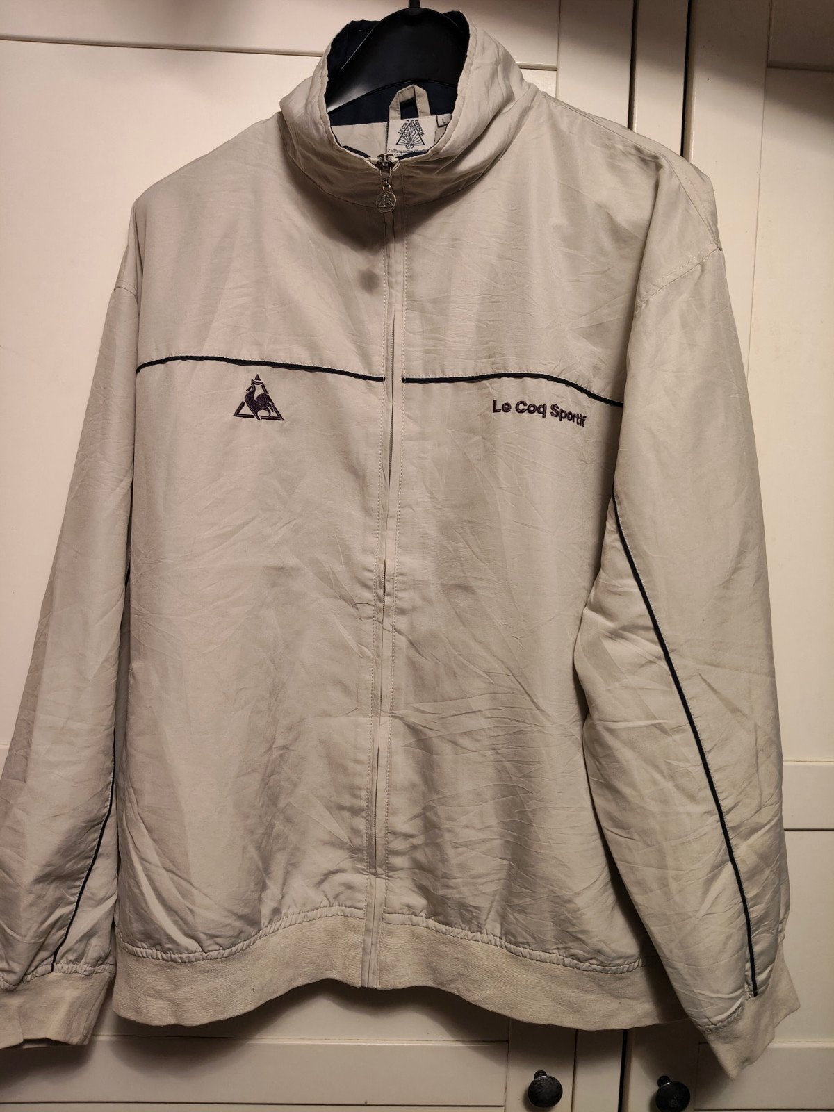 Le Coq Sportif Windjack Maat L - Beige, Maat 52/54 (L), Verzenden, Gedragen, Le Coq Sportif