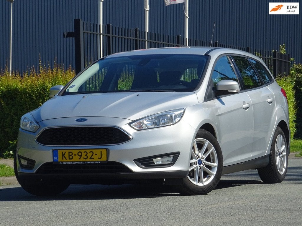 Ford Focus Wagon 1.0 Titanium Edition CLIMA/CRUISE/NW APK, Auto's, Ford, 125 pk, Gebruikt, Euro 6, Handgeschakeld