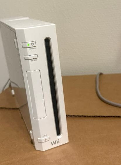 Nintendo Wii + accessoires 4 spellen+ GameCube ondersteuning, Ophalen of Verzenden, Gebruikt, Met 1 controller