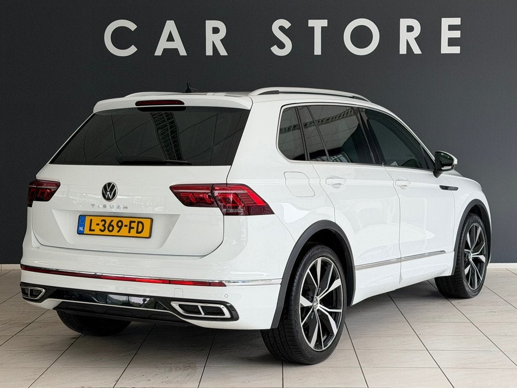Volkswagen Tiguan 1.5 TSI R-Line Business+ Eerste eigenaar D, Auto's, 1441 kg, Stof, 4 cilinders, 150 pk