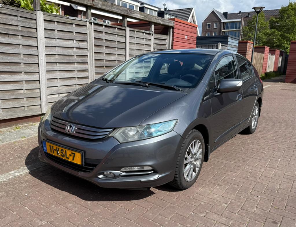 Honda Insight 1.3 Hybrid AUT 2010 Grijs, Stof, Zwart, 4 cilinders, 22 km/l