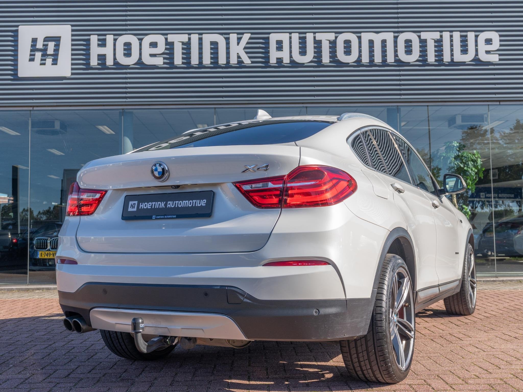 BMW X4 XDrive35i High Executive | Memory | Camera | Afn trek, Auto's, Automaat, Gebruikt, 2000 kg, Leder en Stof