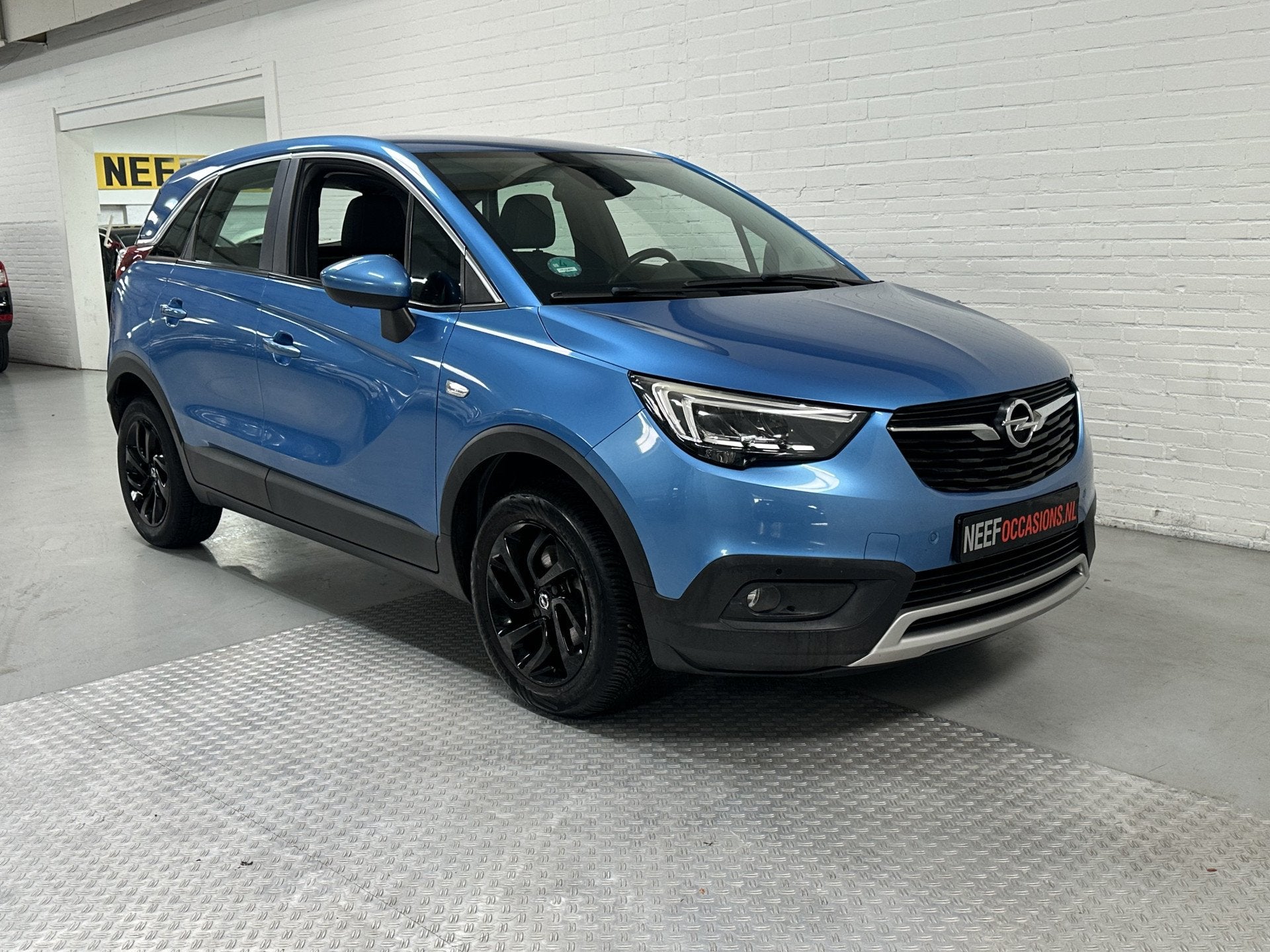 Opel Crossland X 1.2 Turbo Innovation CLIMA // CRUISE // NAV, Auto's, Gebruikt, Blauw, Leder en Stof, Bedrijf