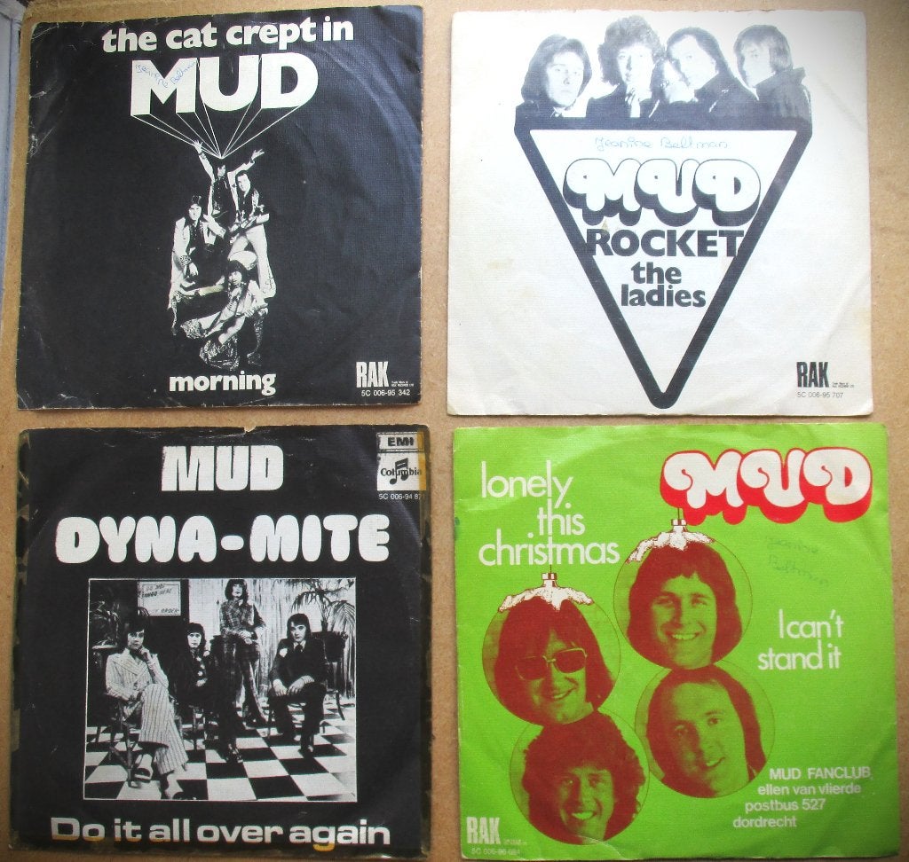 Mud~4x vinyl single~Lonely Christmas~Dynamite~Rocket Lady, Gebruikt, 7 inch, Ophalen of Verzenden, Beschermende buitenhoes
