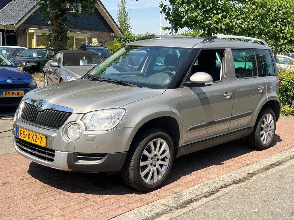 Skoda Yeti 1.2 TSI *AUTOMAAT| TREKHAAK, Auto's, Skoda, Euro 5, Gebruikt, 4 cilinders, Beige