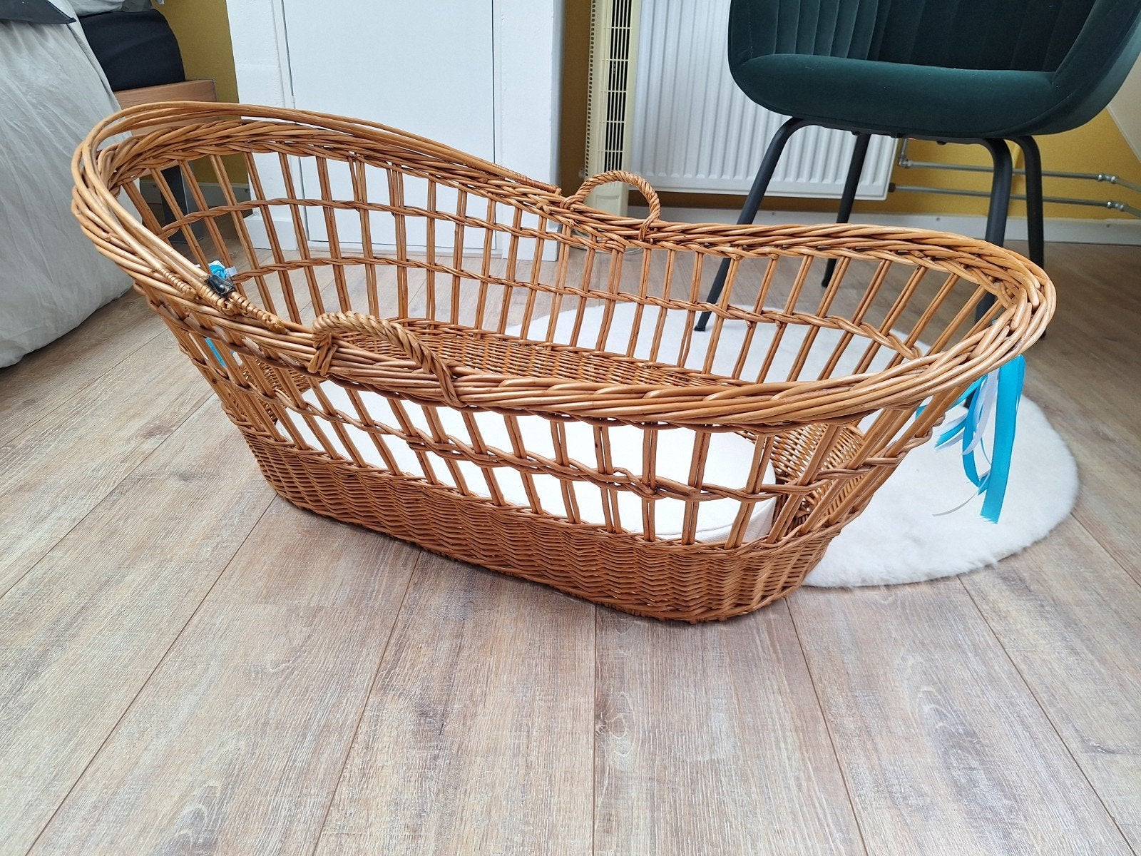 Rieten mand/wieg, Ophalen, Wieg