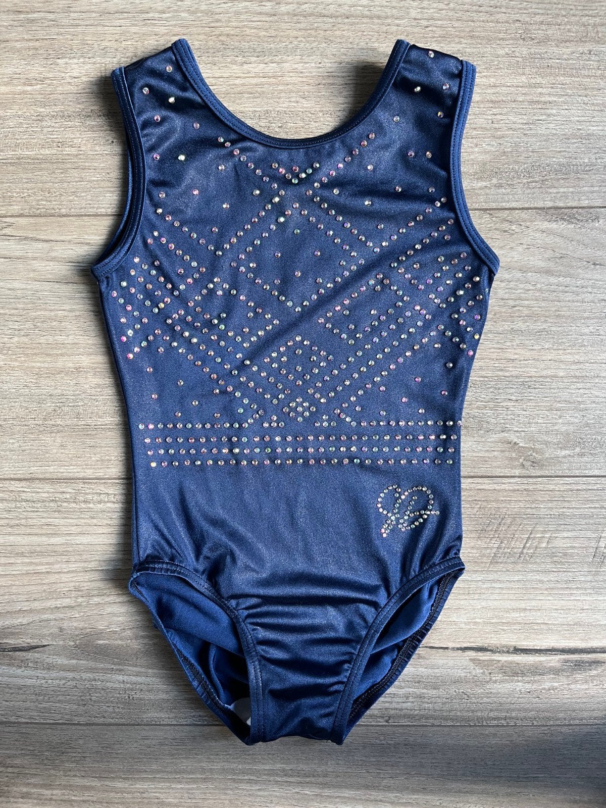 Sparkle and Dream turnpakje donkerblauw - maat 128 (CME), Kindermaat 122 t/m 140, Zo goed als nieuw, Turnpak(je), Verzenden