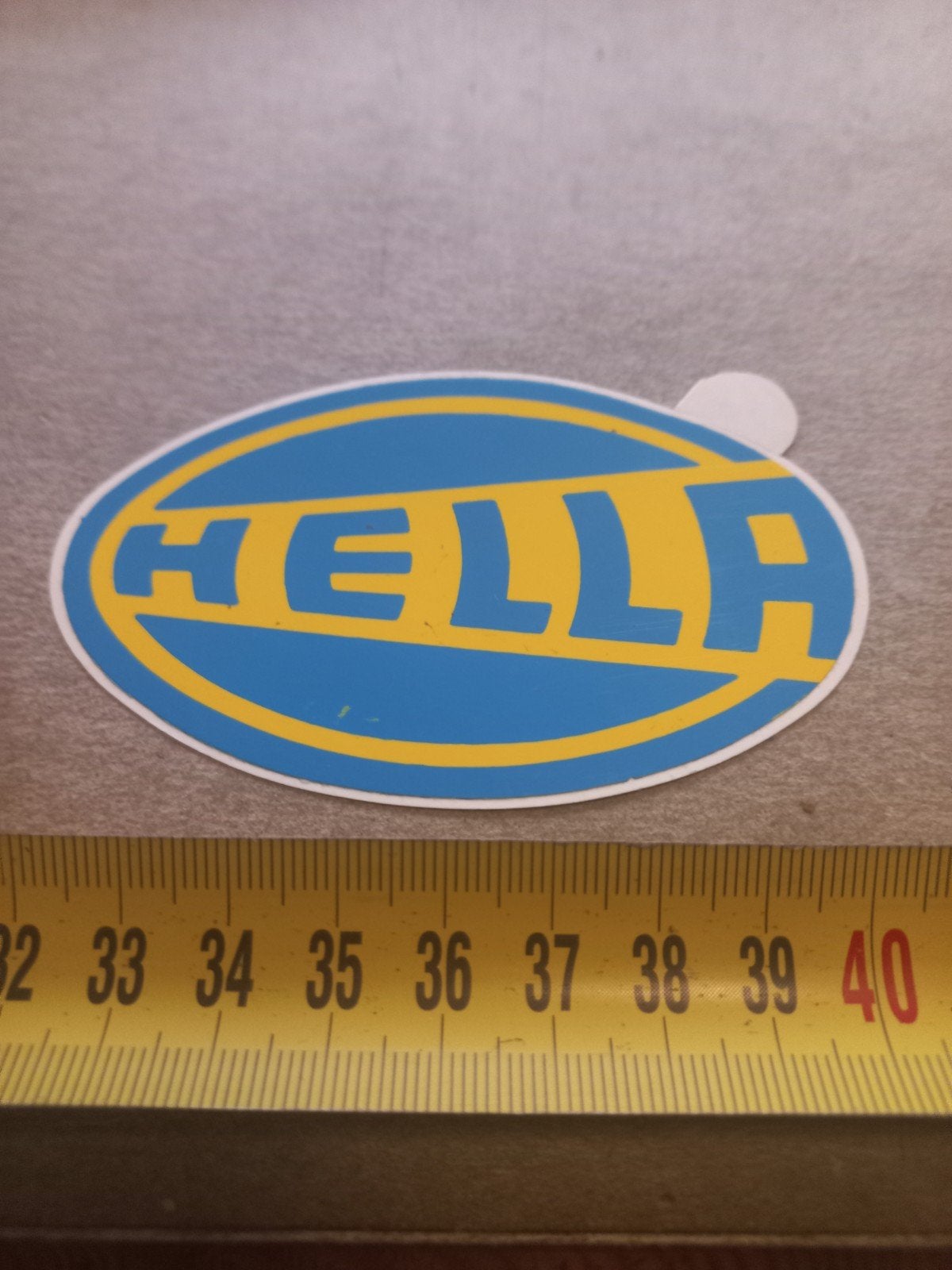 Hella sticker, Ophalen of Verzenden