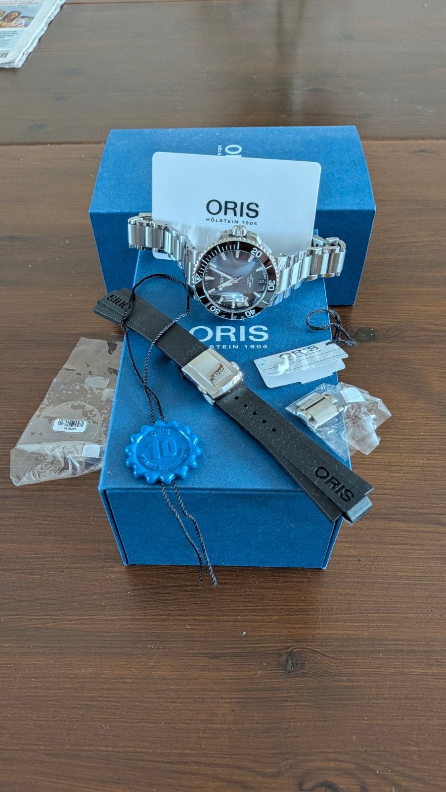Oris Aquis Date Kal.400 van 29-7-2025 Z.g.a.n (Gar.tot 2035), Sieraden, Tassen en Uiterlijk, Horloges | Heren, Overige merken
