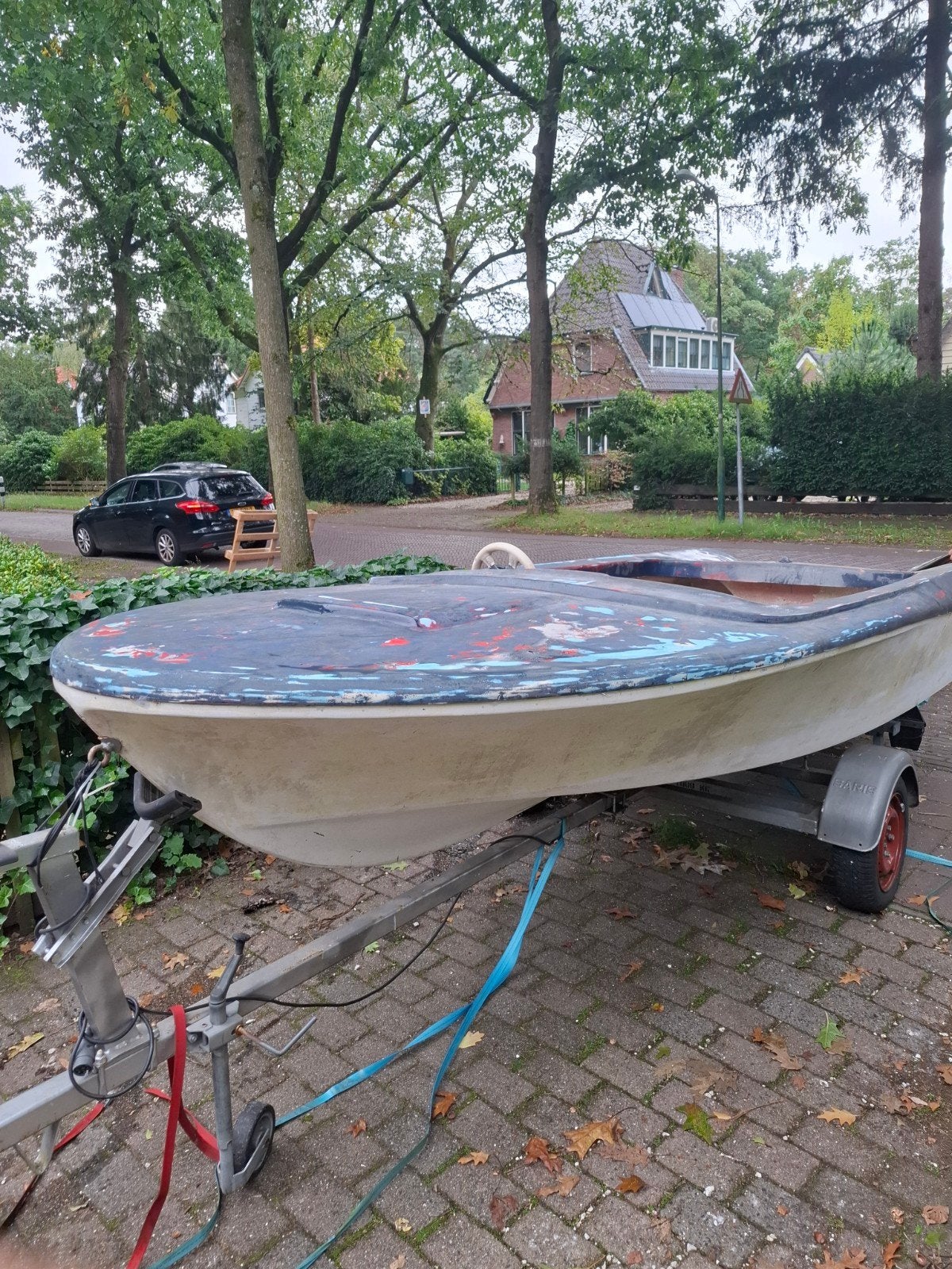 Opknap boot met trailer en reparatieset, Ophalen