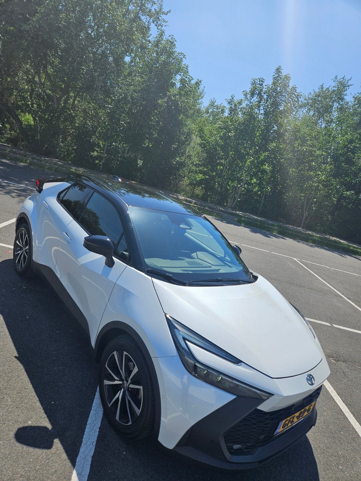Toyota C-HR 1.8 Hybrid 140 First Edition | Tot 2034 garantie, Auto's, Toyota, 725 kg, Wit, Bedrijf, Hybride Elektrisch/Benzine