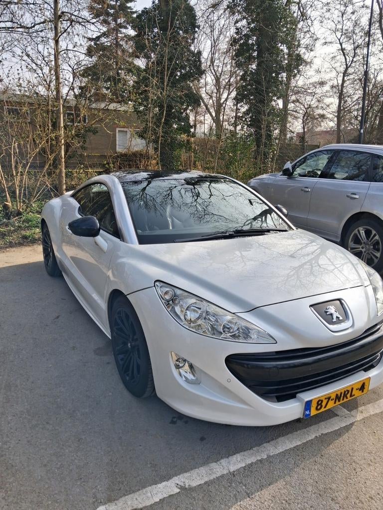 Peugeot RCZ 1.6 THP 2010 Wit limeted edition, Auto's, Peugeot, Voorwielaandrijving, 15 km/l, Zwart, 4 stoelen