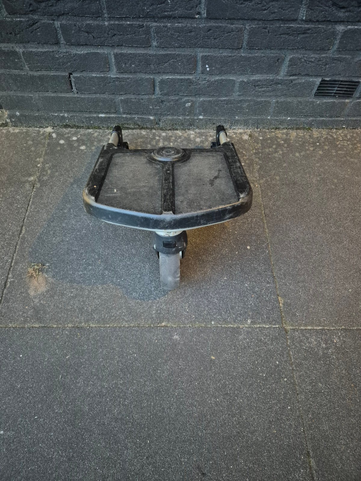 plankje achter de kinderwagen, Ophalen