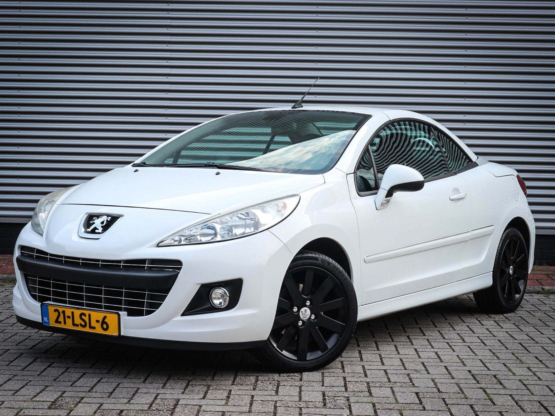 Peugeot 207 CC 1.6 VTi Noir & Blanc | Clima | Cruise | Audio, Voorwielaandrijving, Euro 5, 15 km/l, Gebruikt