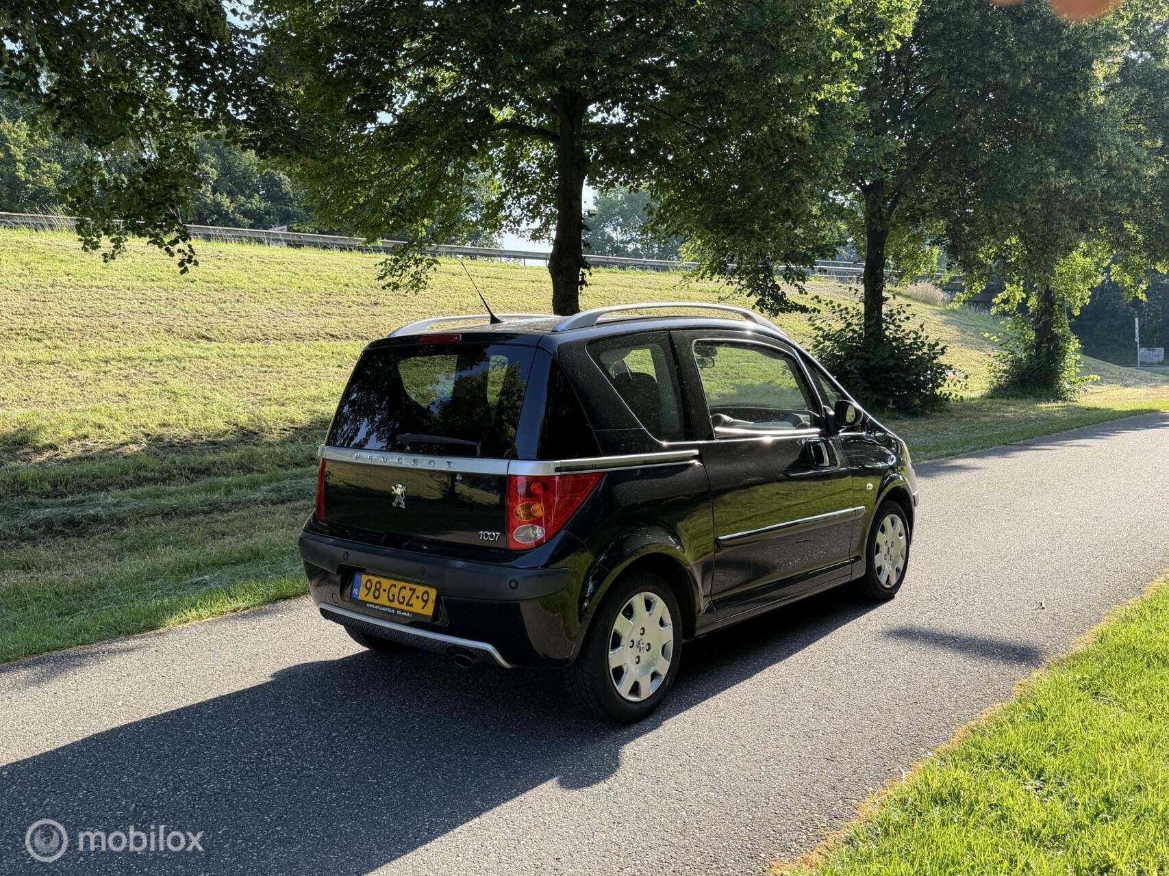 Peugeot 1007 1.6-16V Sporty*AUTOMAAT*NEW APK 6/27*AIRCO*NAP, Auto's, Peugeot, Gebruikt, Zwart, 4 cilinders, 4 stoelen