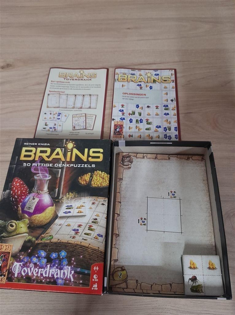 brains 50 pittige denkpuzzels - 999 games - s3434, Hobby en Vrije tijd, Gezelschapsspellen | Bordspellen, Verzenden, Zo goed als nieuw