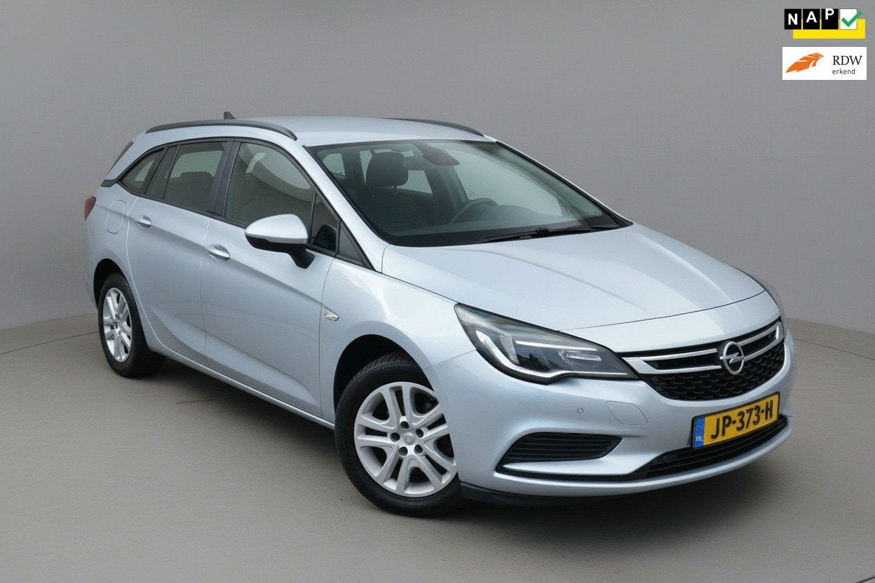 Opel Astra Sports Tourer Airco|Cruise|Navi|2e eigenaar, Voorwielaandrijving, Stof, Euro 6, 1178 kg
