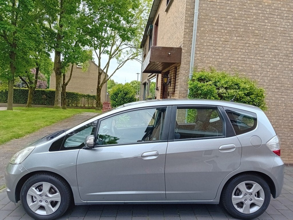 Honda JAZZ 1.4i Comfort *100PK*ECC*LMV*NL AUTO*NAP*ZUINIG*, Euro 5, Huisgarantie, 4 cilinders, Met garantie (alle)