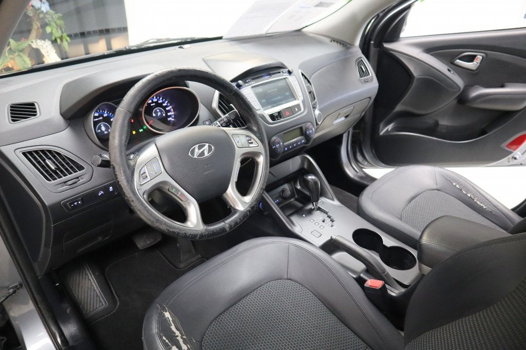Hyundai ix35 2.0i Business Ed.| el.pano | cruise | trekh | c, Auto's, Gebruikt, Zwart, 4 cilinders, Leder en Stof