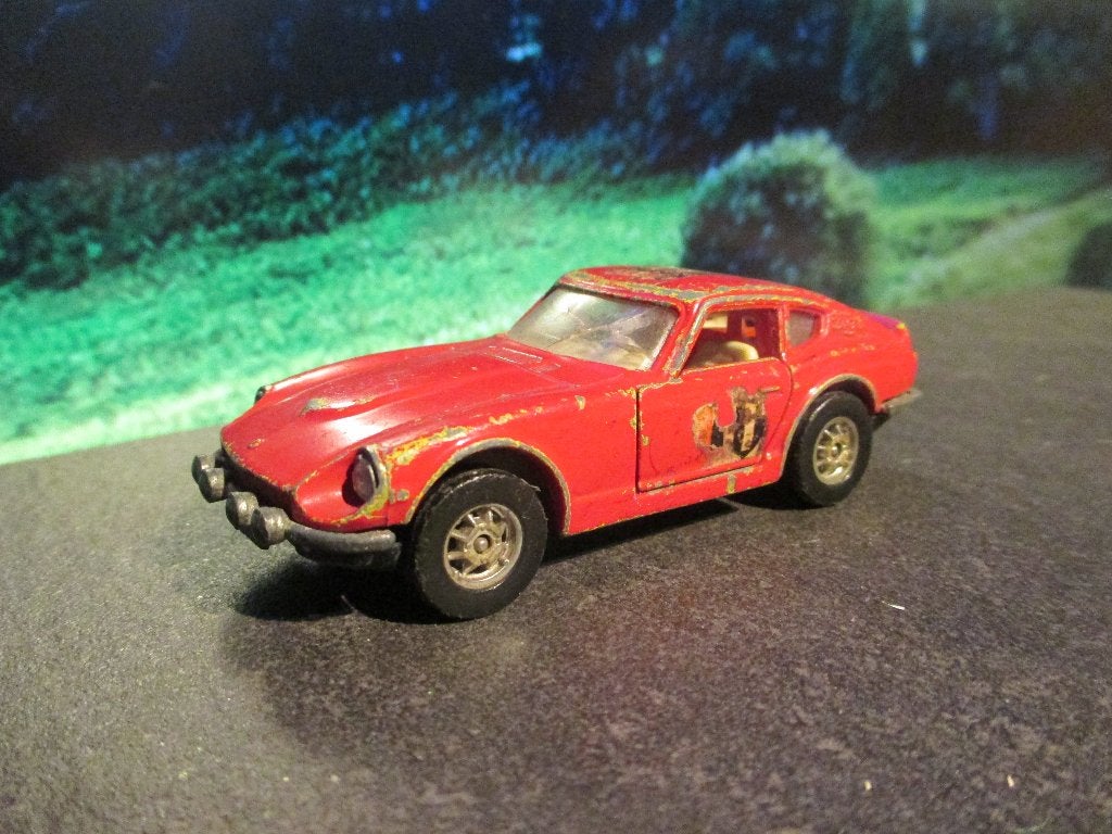 1/43 Datsun 240 Z - Corgi Toys Whizzwheels met verstralers, Hobby en Vrije tijd, Modelauto's | 1:43, Ophalen of Verzenden, Gebruikt