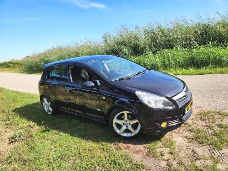 Opel Corsa 1.4 16V Sport OPC Line '09 5drs, Auto's, Voorwielaandrijving, Dealer onderhouden, Origineel Nederlands, Handgeschakeld