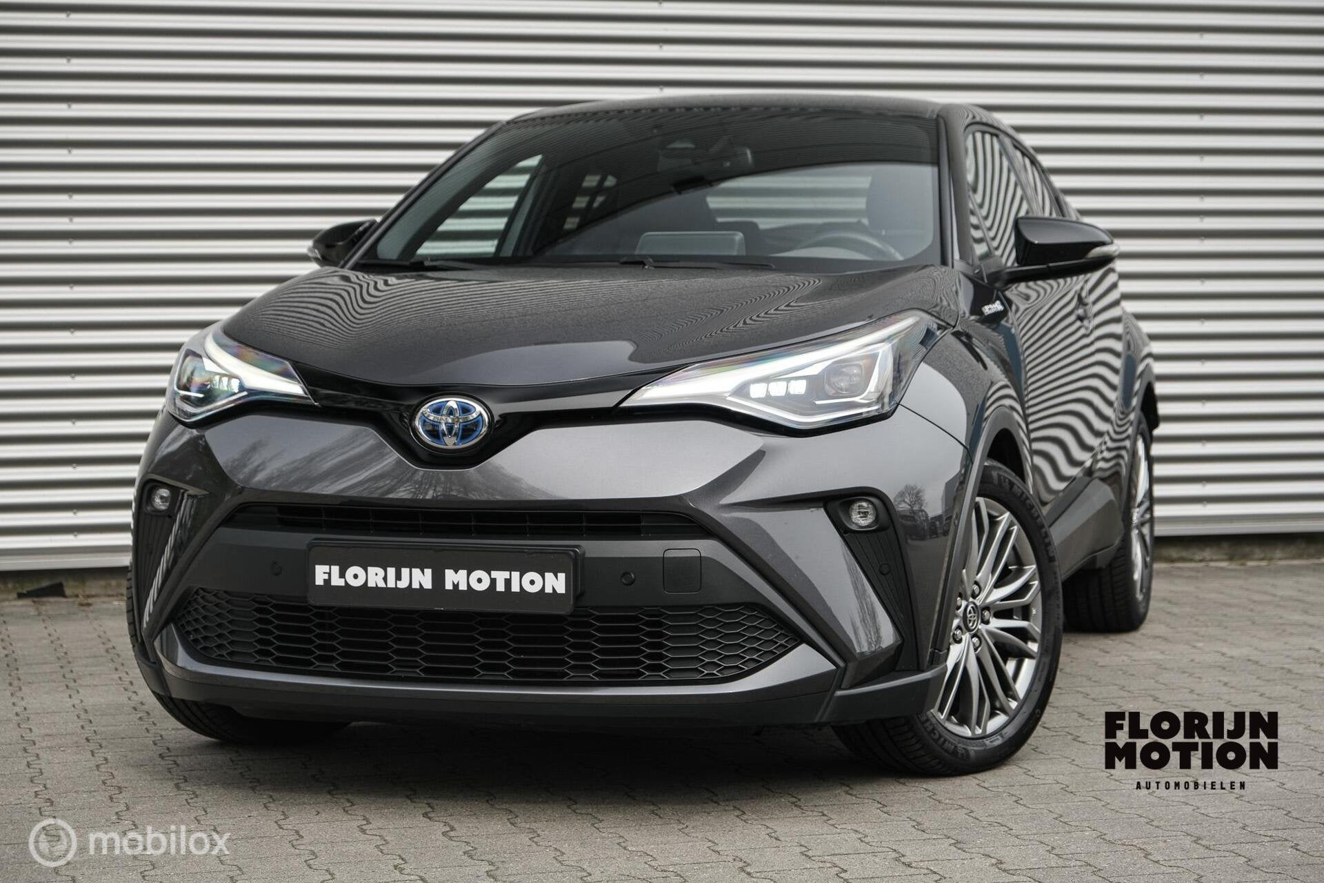 Toyota C-HR 1.8 Hybrid Executive | Camera | Trekhaak | Half-, Auto's, 4 cilinders, Leder en Stof, 122 pk, Automatische klimaatregeling