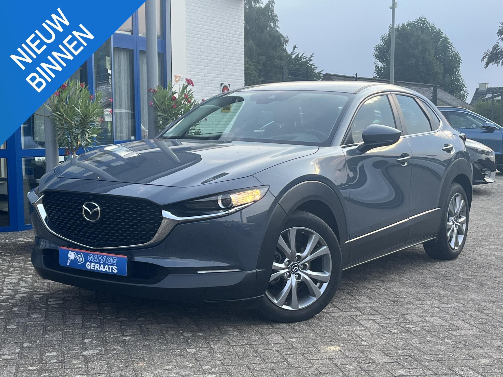 Mazda CX-30 2.0 e-SkyActiv-G M Hybrid Comfort l Automaat, Tr, Auto's, Mazda, Stof, Gebruikt, Euro 6, 4 cilinders