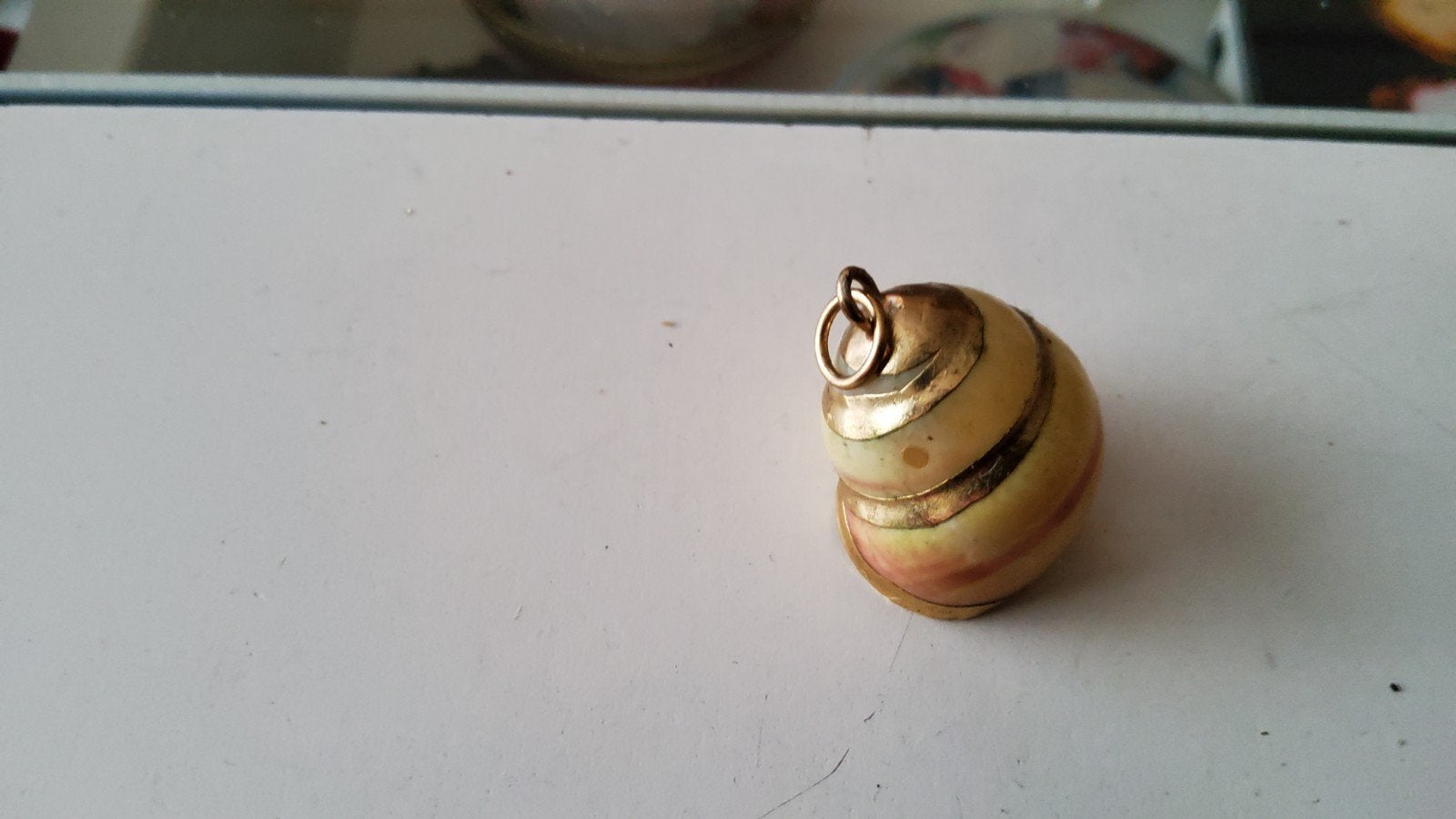 Vintage vergulde Schelpenhanger slakvormige ketting hanger, Ophalen of Verzenden, Overige materialen, Hanger