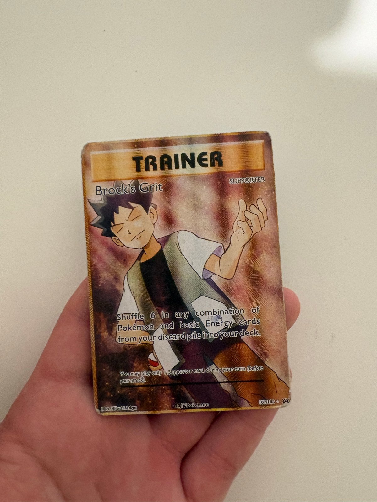 Pokémon Kaart: Brock's Grit Trainer (Foil), Ophalen of Verzenden, Gebruikt, Losse kaart, Foil