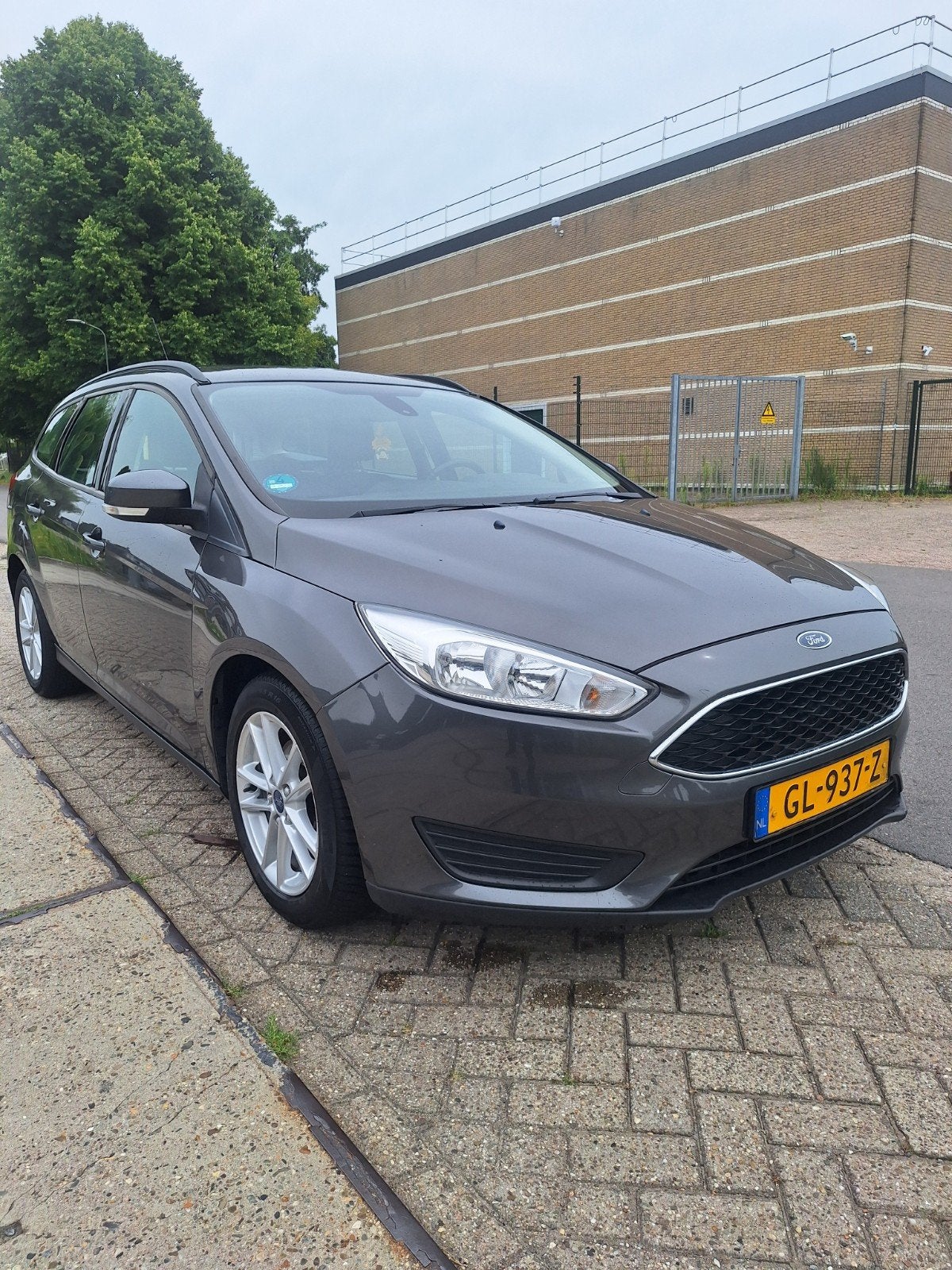 Ford Focus 1.0 Ecoboost 74KW Wagon 2015 Grijs, Auto's, Euro 5, Stof, 100 pk, Origineel Nederlands